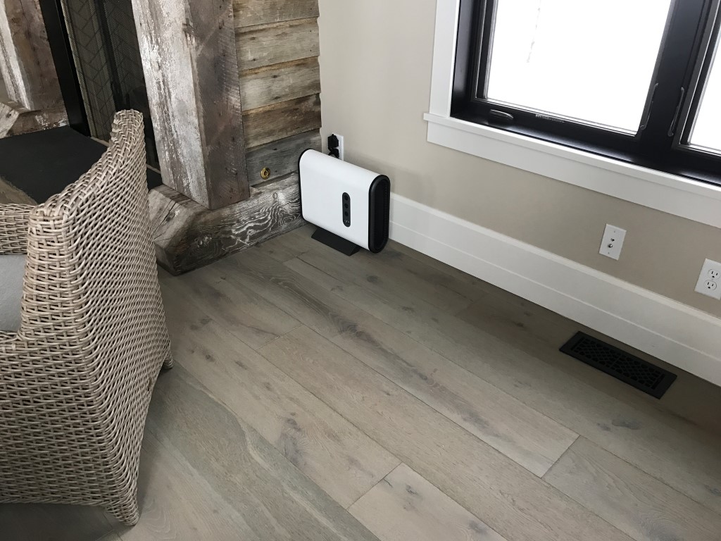 Color coordinated Slim mount subwoofer from Paradigm fills the room with sound while taking up minimal floor space. Another design touch to make the room more the focus and not the electronics.